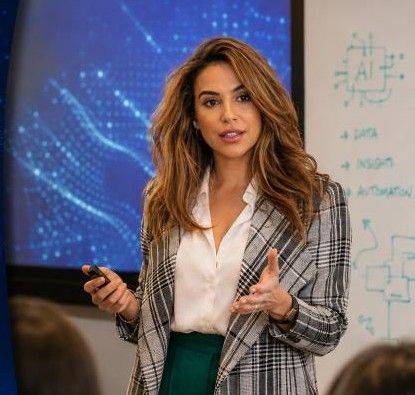 Amanda Khalaf presenting, mid-sentence