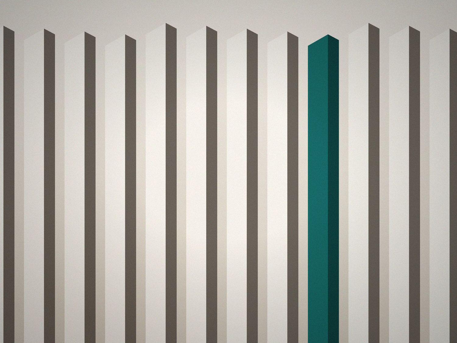 Abstract architectural columns, one standing out in teal